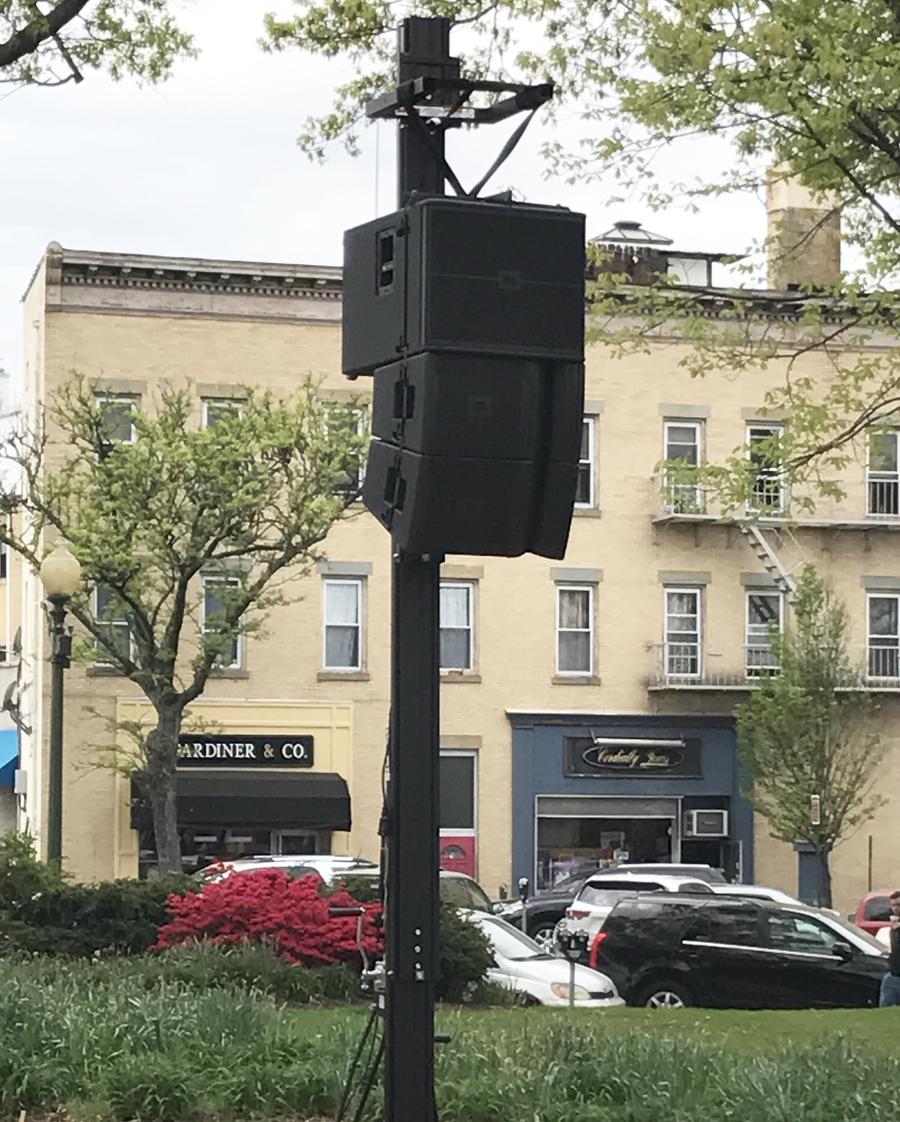 Professional line array speaker system deployed at outdoor community event NJ town center