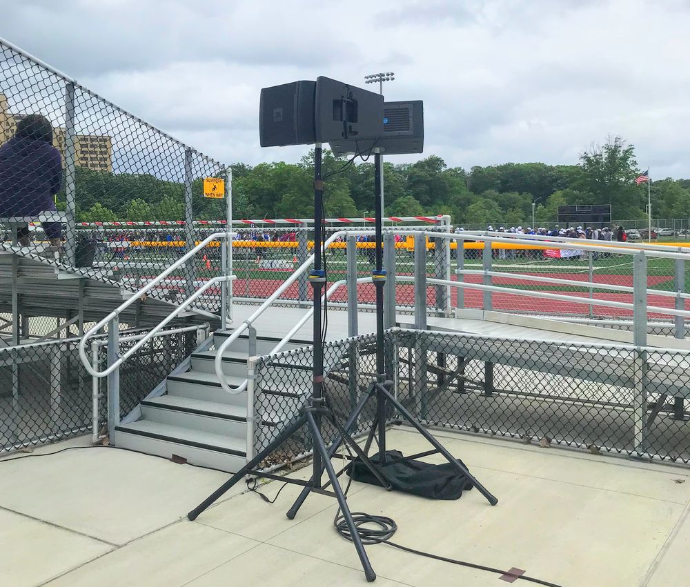 Professional outdoor PA speaker system setup at New Jersey athletic event